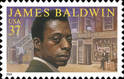 James Baldwin 37 cent US postage stamp with portraint of Baldwin on Harlem street